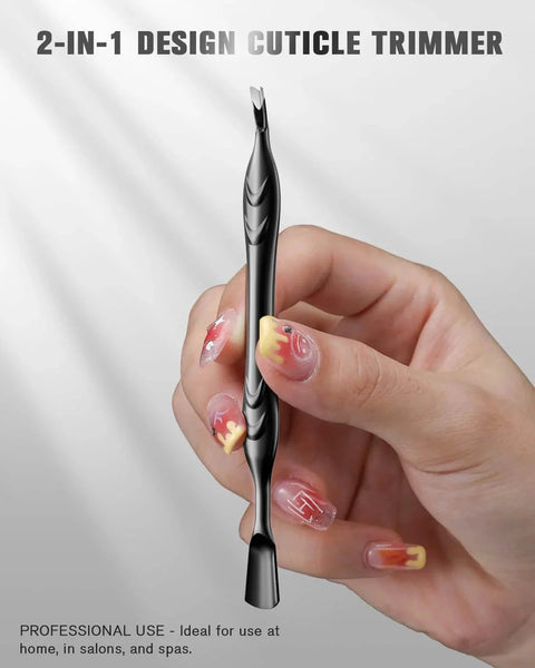Hand holding 2 In 1 Cuticle Pusher And Trimmer With Fork Stainless Steel Nail Care Tool For Manicures And Pedicures Black.