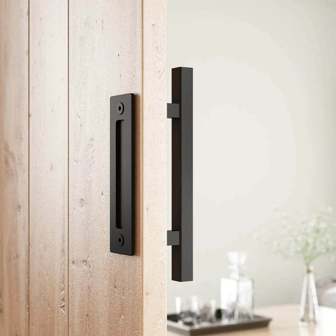 Heavy Duty 12" Pull and Flush Barn Door Handle Set, Large Rustic Two-Side Design, installed on wooden door, solid steel, black.