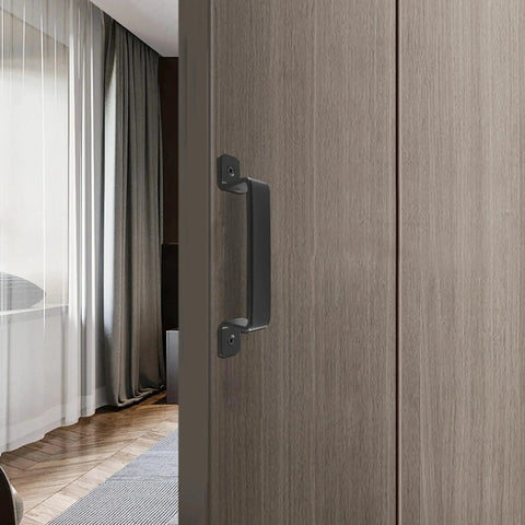 Sliding Barn Door Handle Black Steel, 7.5 Inch Length, installed on a wooden door in a modern interior