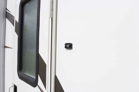 Never Fade Two Way Stick On Level Black With Self Adhesive Back For Quick Plumb And Level Checks installed on RV wall.