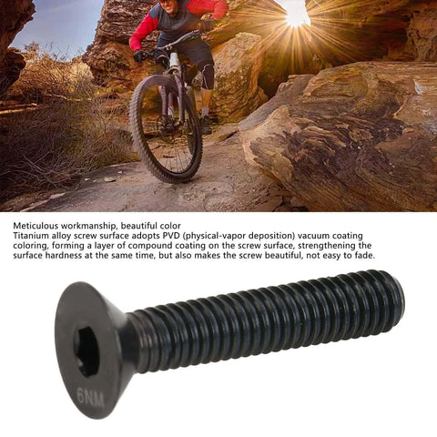Bike rider on rugged trail with M6 x 30mm Black Titanium Alloy Flat Head Headset Cap Bolt showcasing durability in outdoor conditions.