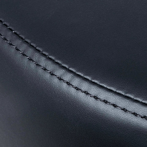 Close-up of black vinyl fabric on Round 17 Inch Vinyl Table Height Stool With 360 Degree Swivel Heavy Duty Lab Medical Garage Home Spa Cleanroom Chair