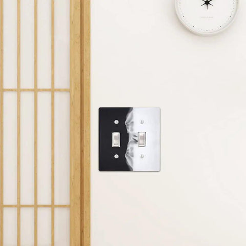 7 Piece Light Switch Cover Resin Molds Set for Epoxy Resin Crafts, features a custom black and white switch plate installed on a wall