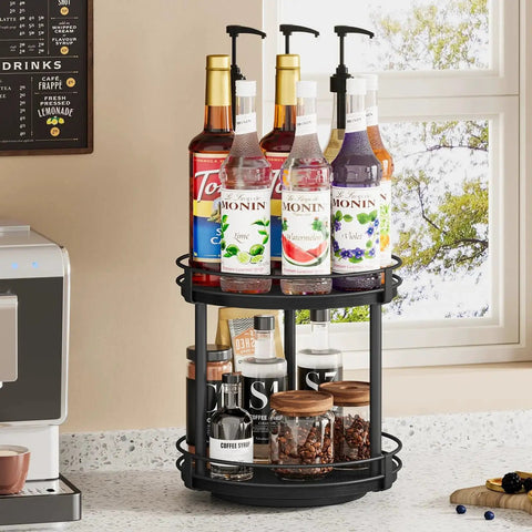 Two Tier Wooden Lazy Susan Spice Rack With 360 Degree Rotation for countertop displaying syrup bottles and coffee supplies, black finish.