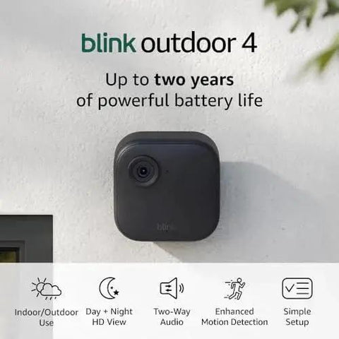 Wire-free two-camera outdoor security kit with Sync Module 2 delivers 1080p HD day and infrared night vision mounted on wall