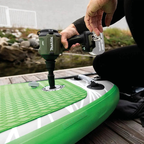 Person using Outdoor Adventure 18V LXT Brushless Cordless High Speed Blower and Inflator Tool Only With 447 MPH Max Air 39 CFM on inflatable water device.