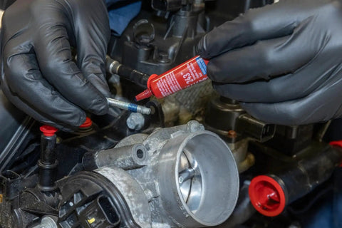 Applying Blue 243 Oil-Resistant Threadlocker for Automotive Applications, Medium-Strength Anaerobic Adhesive to metal fastener