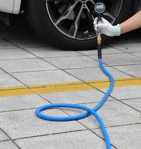 Hybrid Air Hose Three Eighths Inch By Twenty Five Feet 300 PSI Heavy Duty Lightweight Kink Resistant in use with tire gauge