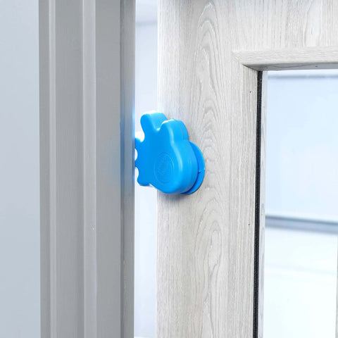 Blue Anti Slam Door Safety For Kids Two Pack Finger Trap Stoppers With Adhesive Pad attached to door handle
