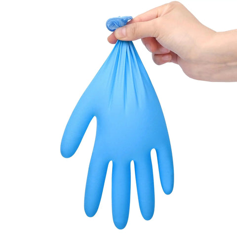 Person holding Blue 6 Mil Heavy Duty Nitrile Glove, Textured, Powder Free, Latex Free, Box Of 100, demonstrating flexibility.