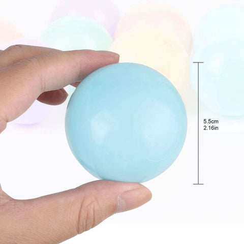 Hand holding a light blue macaron color ocean ball, 5.5 cm diameter, showcasing size for 5 Mixed Colors Macaron Ocean Ball set.