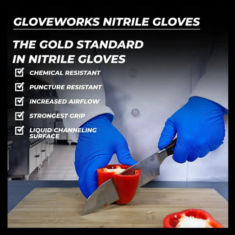 Person wearing Royal Blue Nitrile Gloves 6 Mil Latex Free Raised Diamond Texture Medium while slicing a red pepper