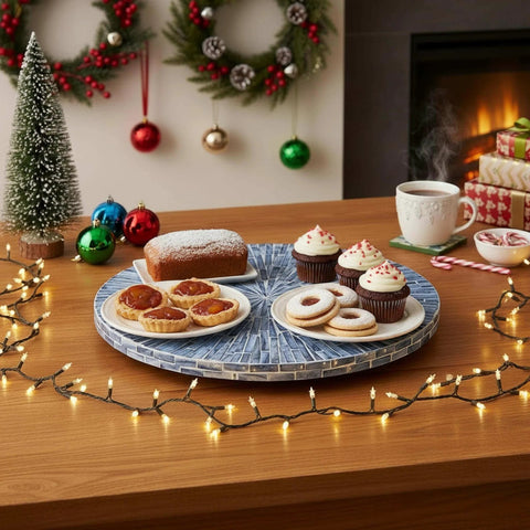 12.6 inch mother of pearl lazy susan turntable with blue starburst design, decorative rotating tray hosting holiday treats.