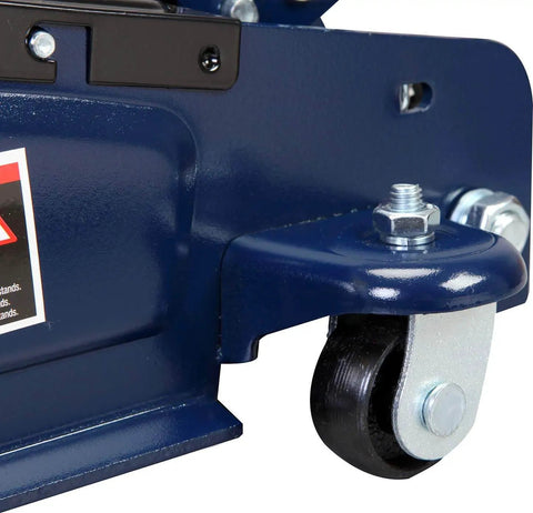 Close-up of Heavy Duty Two And A Half Ton Low Profile Hydraulic Trolley Floor Jack With Quick Lift Pump And Safety Bypass For Cars Trucks And SUVs Torin Durable Steel Construction Three And One Third Inch To Fifteen Inch Lift Blue Finish caster wheel.