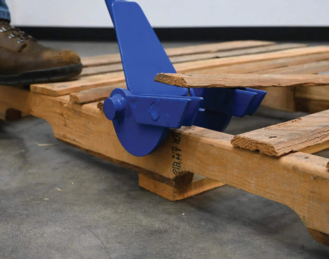 Deluxe Steel Pallet Buster With 41 Inch Handle For Easy Pallet Disassembly And Dock Board Removal in use on wooden pallet