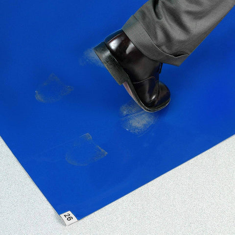 Foot stepping on blue Cleanroom Sticky Mat For Dirt And Dust Capture In Hospitals And Labs, 24 By 36 Inches, adhesive tacky mat.
