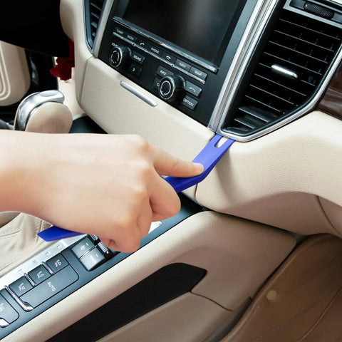 Using Blue 13 Piece Auto Trim Removal Tool Kit With Car Door Panel Removal Tools on car dashboard for trim removal