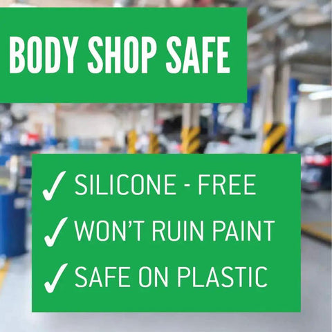 Sign showing 'Body Shop Safe' with silicone-free, won't ruin paint, and safe on plastic features in an auto shop background.