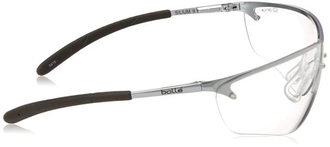 Side view of Bollé Silium Safety Eyewear with silver metal frame and anti-fog coated lenses, showing flexible temples.