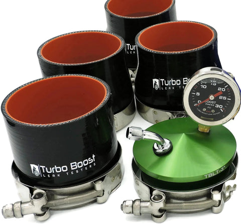 Turbo Boost leak tester kit with four black silicone intake tubes, orange interiors, 30 PSI gauge, and green canister.