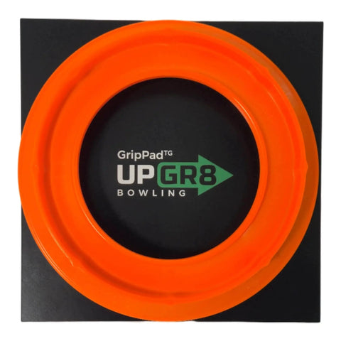 Top view of orange Bowling Ball Sanding Pad Holder for Surface Shaping and Consistent Reaction on black background.
