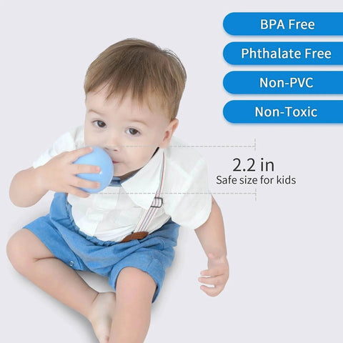 Toddler with blue play ball, showcases the size and non-toxic features, part of the Ball Pit Balls for Kids, Plastic Play Balls Blue Balls for Ball Pits.