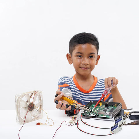 TEHAUX 12V mini push-pull solenoid electromagnet used in electronics project; child assembling circuit board.
