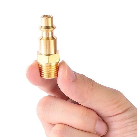 Close-up of a Brass 1/4 Inch NPT Male Air Hose Quick Connect Adapter Kit With Industrial M Style Couplers And Plugs, held in hand.