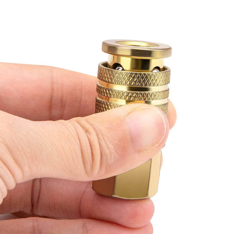 Two Pack One Quarter Inch NPT Female Air Hose Couplers Brass Quick Connect Fittings for Air Compressors, close-up view in hand