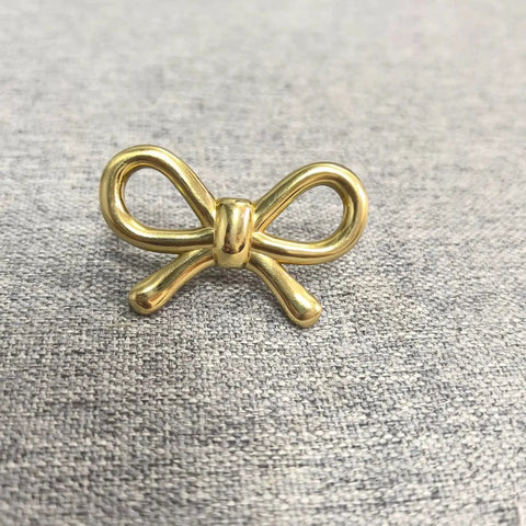 2 Pack Solid Brass Bow Drawer Knobs In Gold, Vintage Cabinet Hardware for Kitchen, Vanity, Dresser, showing elegant gold bow design