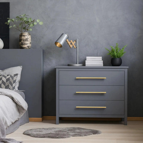 Solid Brass Cabinet Pulls 2 Pack Gold Brushed Finish Long Drawer Handles With 10 Inch Center To Center For Large Kitchen Cabinets Cupboards Dresser Wardrobe Closet Doors Euro T Bar Design Heavy Duty Fingerprint Resistant installed on a gray dresser in a modern bedroom.