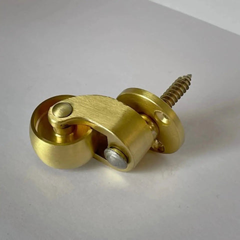 Solid Brass Caster Wheel Set 25mm Diameter 360 Degree Swivel With Screw Fitting Vintage Style Furniture Casters Quiet Smooth Rolling 150kg Load Capacity Per Caster Durable Wear Resistant Polished Brass Set Of 4, front view of a single caster.