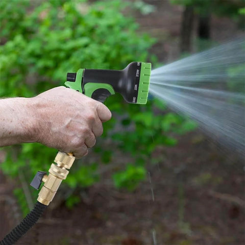 All Brass Garden Hose Quick Connect Fittings Three Quarter Inch GHT Easy Connect Male Only Eight Pack in use nozzle spraying water
