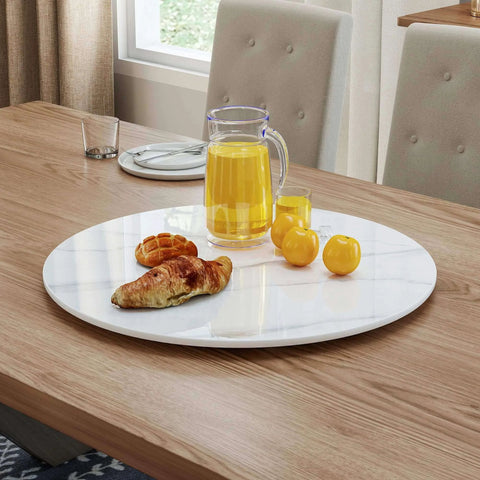 23.6 inch sintered stone lazy susan turntable in white featuring breakfast items on a wooden table.