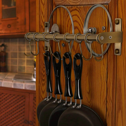 Pot Rack - Pots & Pans Hanging Rack with 8 Hooks, Double Bars, Wall Mounted, Bronze, Pack of 2 installed on wood wall