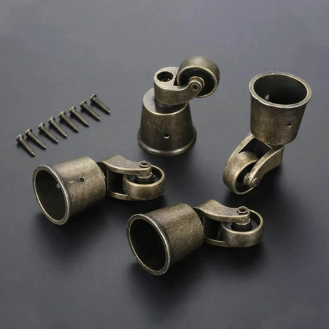 Vintage Bronze Swivel Cup Caster Set 4 Pieces, Universal Metal Pulley Wheel Casters with mounting screws on dark surface