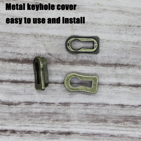 5 Pack Zinc Alloy Keyhole Covers in Bronze Tone displayed on wood surface, showing 18x8mm size and durable zinc material.