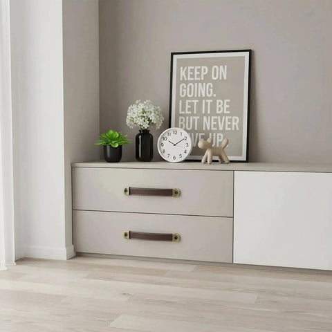 4 Piece Leather Cabinet Pulls And Luggage Handles Replacement installed on white drawers, featuring brown leather and pre-drilled holes.