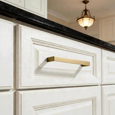 Brushed Brass Cabinet Pulls Set Of 10, 3-Inch Hole Center Handles in gold on white kitchen cabinets, solid square design