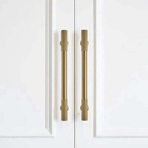 2 Pack 6 Inch Hole Center Brushed Brass Cabinet Pulls For Drawers Dressers And Cabinets installed on white cabinet doors