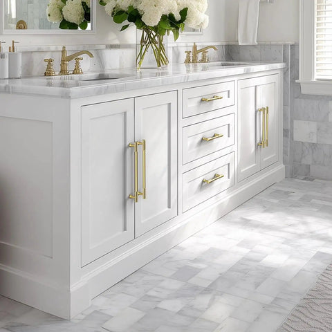 Bathroom vanity with 20 Pack Brushed Gold Cabinet Handles Five Inch Kitchen Cabinet Pulls in solid zinc alloy, installed on white doors.