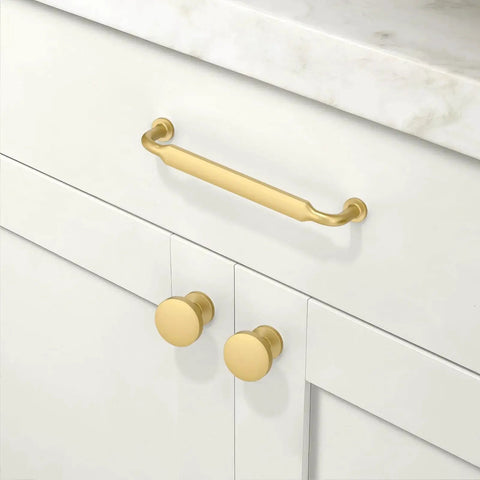 Brushed Gold Cabinet Pulls 5 Inch 128mm Pack Of 10 Kitchen Cabinet Handles installed on white drawer with smooth finish