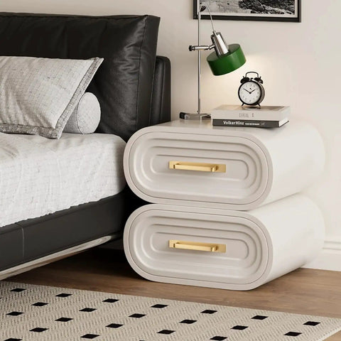 Modern bedroom with white nightstand featuring solid brass cabinet pull with backplate set of 2 in brushed gold finish and 5 inch hole centers.