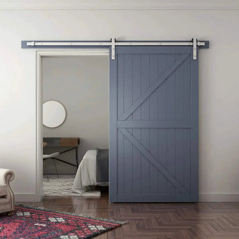 Eight Feet Brushed Nickel Sliding Barn Door Hardware Kit With I Shape Hanger For A 48 Inch Wide Door Panel installed in a bedroom