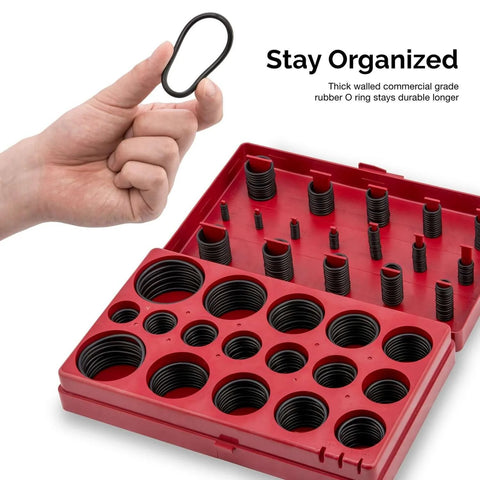 Hand holding o-ring over Must Have O Ring Assortment Kit With Buna N Rubber Seals, 407 Piece Set, 32 SAE Sizes in red case.