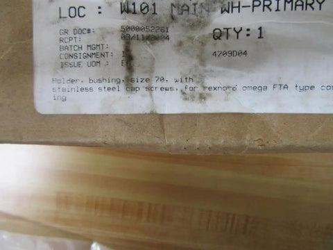 Label on packaging for Rexnord bushing holder, size 70, stainless steel cap screws, warehouse location W101, with QTY:1.