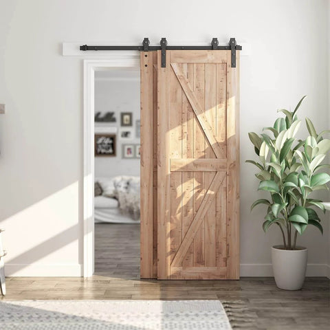 Installed 5 Feet Bypass Sliding Barn Door Hardware Kit for Double Wooden Doors with Single Track in a living room setting.