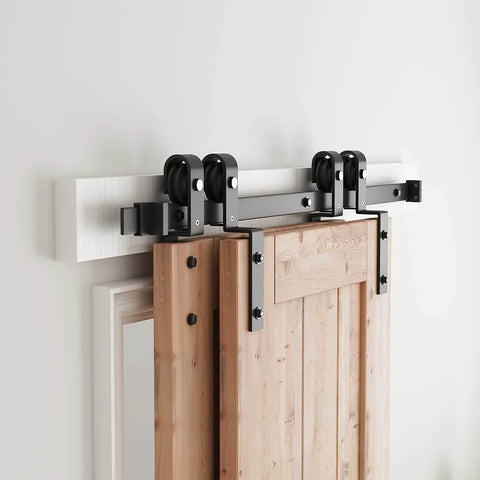 4 Feet Bypass Sliding Barn Door Hardware Kit for Double Wooden Doors with Single Track in use, showing heavy duty carbon steel rail installation