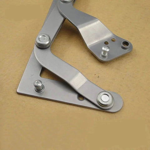 Lift Up Mechanism Support Vertical Swing Lifting Stay Strut Hydraulic Cylinder, metal hinge on brown background