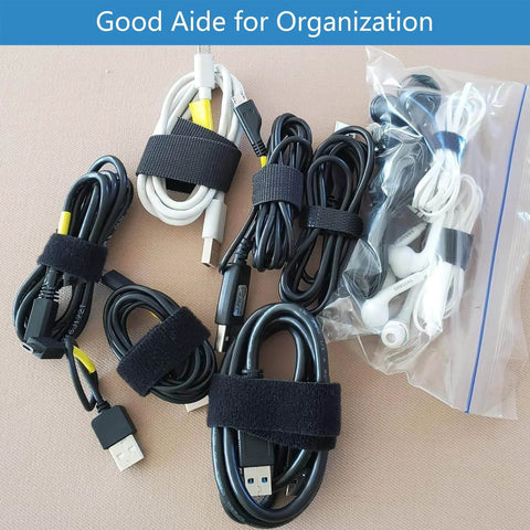 Coiled cables bundled with Double Sided Hook And Loop Straps For Quick Wrap Cable Bundling And Organization Heavy Duty 2 Inch Wide Self Gripping Nylon Roll